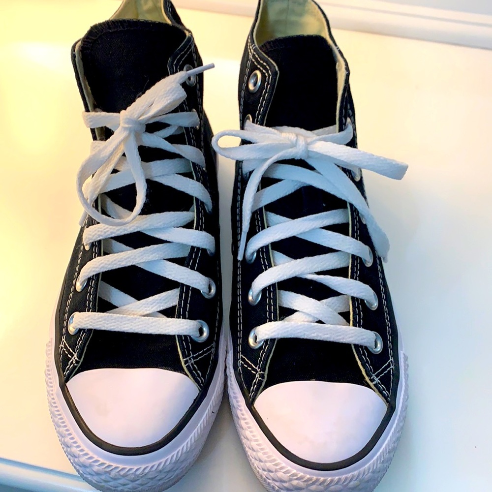 Woman’s Black Converse All Stars, size 7.5.